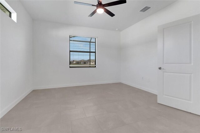 19513 Hinkley Dr, Estero, FL 33928 - spare room featuring baseboards, visible vents, and ceiling fan