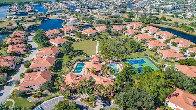 5956 Tarpon Gardens Cir Unit 201, Cape Coral, FL 33914 - birds eye view of property with a residential view and a water view