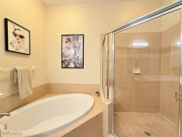 5956 Tarpon Gardens Cir Unit 201, Cape Coral, FL 33914 - full bathroom featuring a garden tub and a shower stall