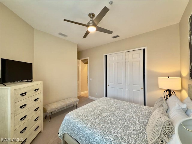 5956 Tarpon Gardens Cir Unit 201, Cape Coral, FL 33914 - carpeted bedroom with baseboards, visible vents, a closet, and ceiling fan