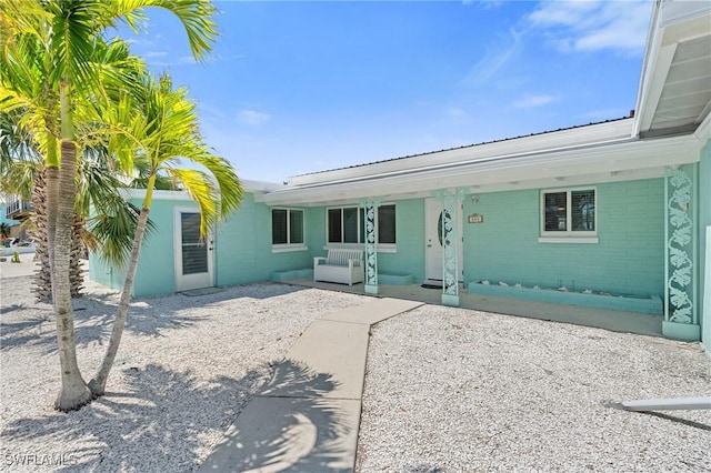411 Connecticut St, Fort Myers Beach, FL 33931 - view of front of home with concrete block siding