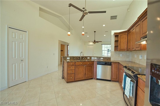 1675 Blue Lake Cir, Punta Gorda, FL 33983 - kitchen featuring a sink, brown cabinetry, appliances with stainless steel finishes, and ceiling fan