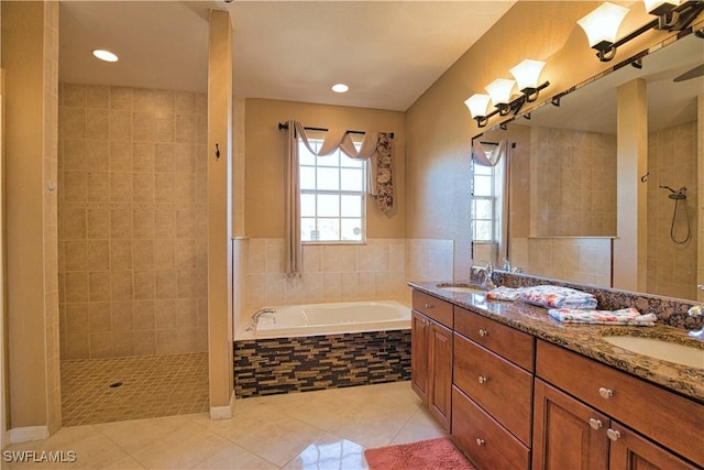 1675 Blue Lake Cir, Punta Gorda, FL 33983 - full bath with tile patterned floors, walk in shower, a bath, and a sink
