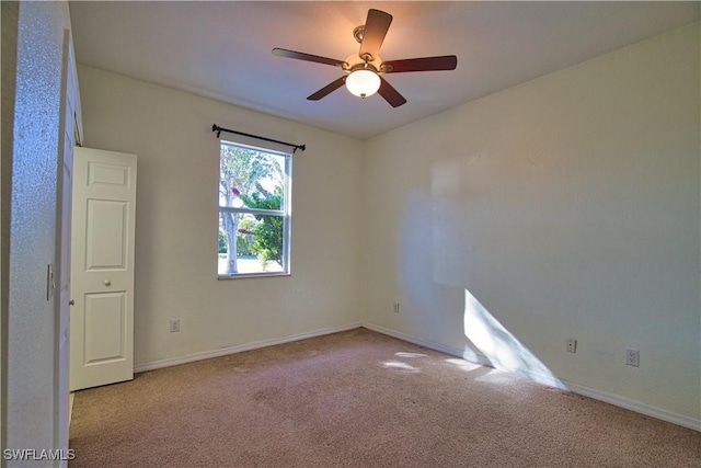 1675 Blue Lake Cir, Punta Gorda, FL 33983 - carpeted empty room with baseboards and a ceiling fan
