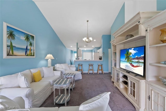 4970 Deerfield Way Unit F202, Naples, FL 34110 - living area with lofted ceiling, carpet flooring, a chandelier, and baseboards