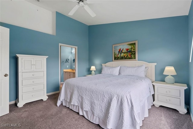 4970 Deerfield Way Unit F202, Naples, FL 34110 - carpeted bedroom featuring connected bathroom, ceiling fan, baseboards, and a high ceiling
