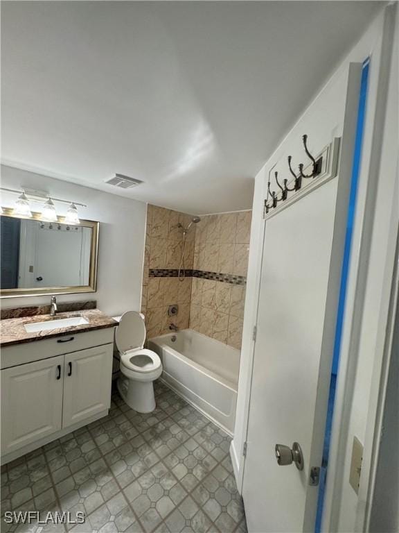 177 Santa Clara Dr Unit 177-5, Naples, FL 34104 - full bathroom featuring vanity, tub / shower combination, and toilet