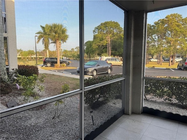 177 Santa Clara Dr Unit 177-5, Naples, FL 34104 - unfurnished sunroom with healthy amount of natural light