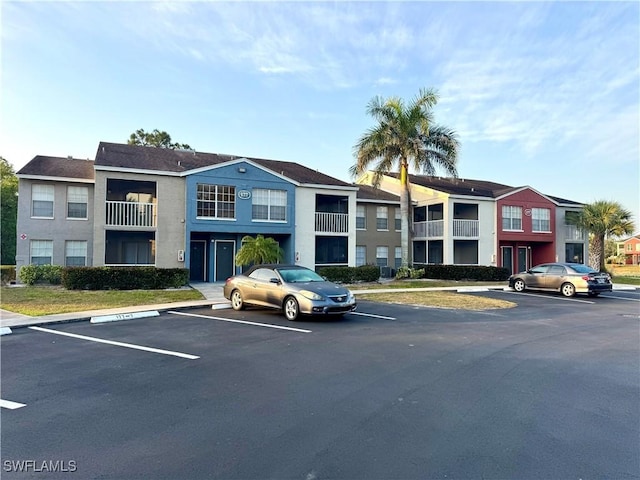 177 Santa Clara Dr Unit 177-5, Naples, FL 34104 - view of property featuring uncovered parking