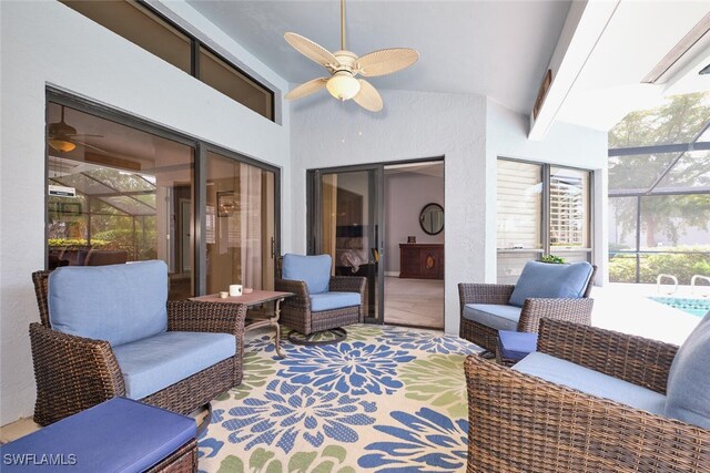 15440 Kilmarnock Dr, Fort Myers, FL 33912 - sunroom featuring outdoor lounge area, beam ceiling, and ceiling fan