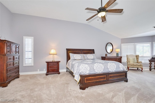 15440 Kilmarnock Dr, Fort Myers, FL 33912 - bedroom featuring a ceiling fan, vaulted ceiling, baseboards, and light colored carpet