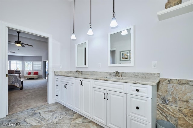 15440 Kilmarnock Dr, Fort Myers, FL 33912 - ensuite bathroom with a ceiling fan, a sink, double vanity, and ensuite bathroom