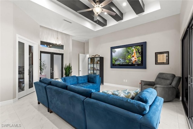 living area featuring marble finish floor, baseboards, french doors, and a ceiling fan