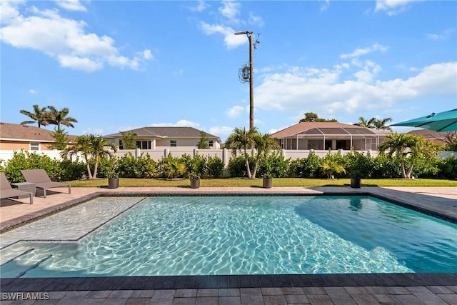 view of swimming pool with a fenced in pool, fence, and a patio area