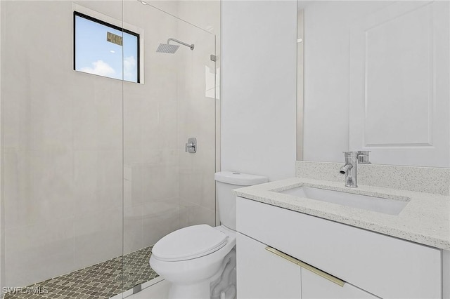 231 NW 27th Ave, Cape Coral, FL 33993 - bathroom featuring toilet, vanity, and a tile shower