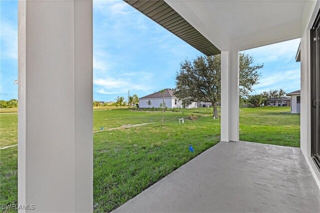 231 NW 27th Ave, Cape Coral, FL 33993 - view of yard featuring a patio area
