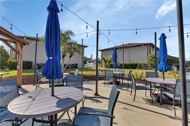 25100 Sandhill Blvd Unit 103, Punta Gorda, FL 33983 - view of patio featuring outdoor dining space