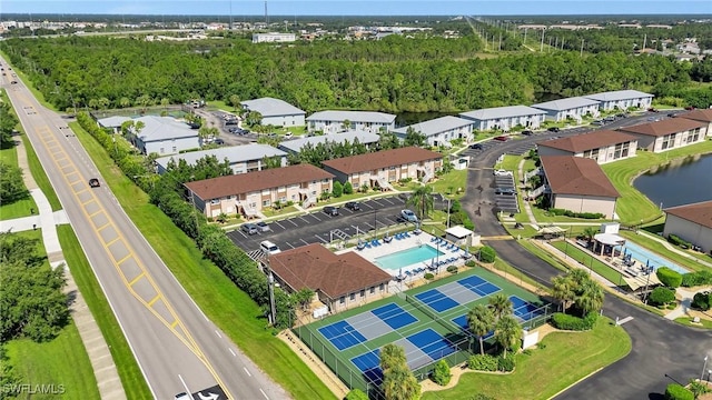 25100 Sandhill Blvd Unit 103, Punta Gorda, FL 33983 - drone / aerial view of a pool and a nearby body of water