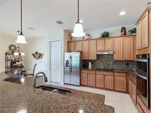 21826 Bella Terra Blvd, Estero, FL 33928 - kitchen with a sink, tasteful backsplash, appliances with stainless steel finishes, under cabinet range hood, and visible vents