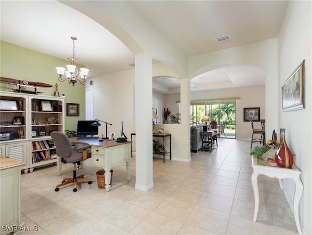 21826 Bella Terra Blvd, Estero, FL 33928 - home office with visible vents, arched walkways, light tile patterned floors, and an inviting chandelier