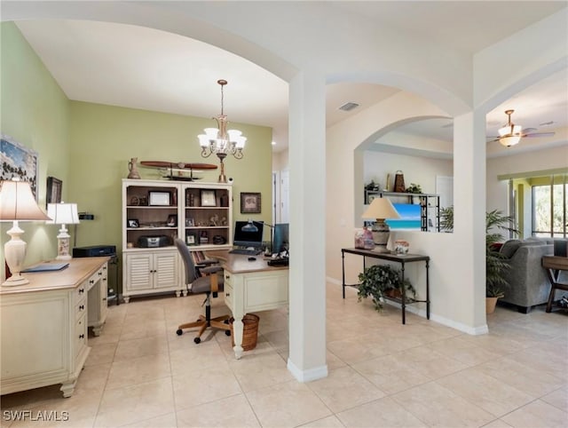 21826 Bella Terra Blvd, Estero, FL 33928 - office space featuring baseboards, light tile patterned floors, ceiling fan with notable chandelier, visible vents, and arched walkways