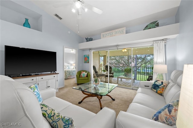 8073 Panther Trl Unit 1403, Naples, FL 34113 - carpeted living room with visible vents, high vaulted ceiling, and ceiling fan