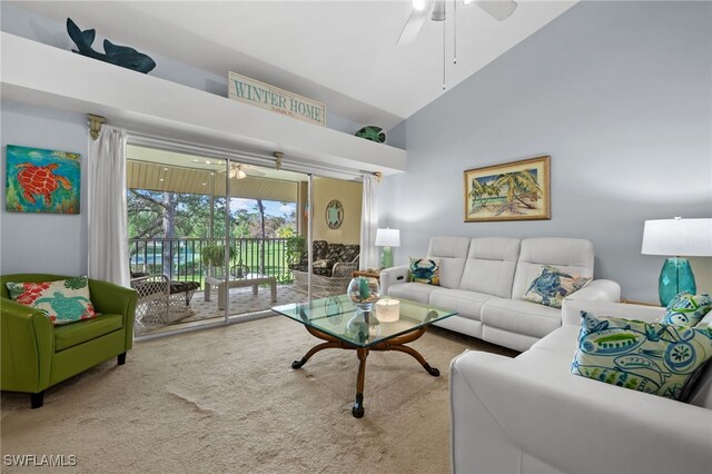 8073 Panther Trl Unit 1403, Naples, FL 34113 - living area with carpet, ceiling fan, and a towering ceiling
