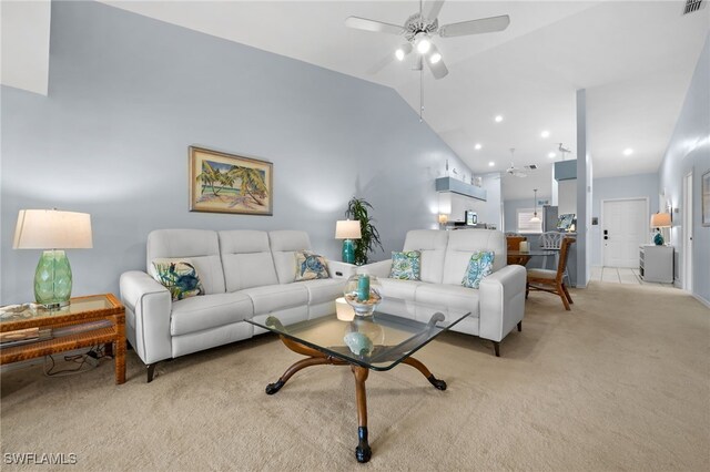 8073 Panther Trl Unit 1403, Naples, FL 34113 - living area featuring light carpet, ceiling fan, and vaulted ceiling