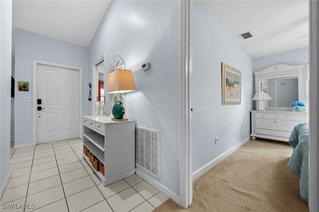 8073 Panther Trl Unit 1403, Naples, FL 34113 - corridor with light tile patterned floors, baseboards, and visible vents