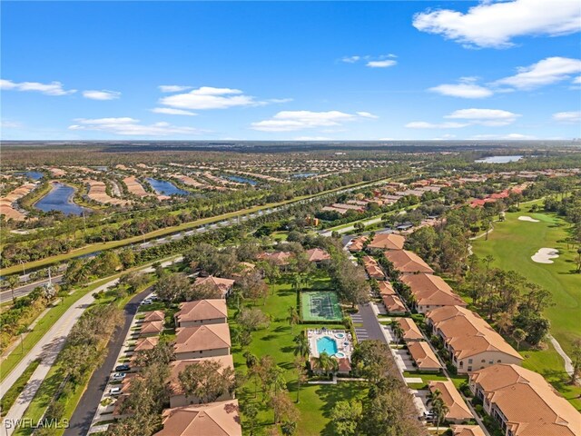 8073 Panther Trl Unit 1403, Naples, FL 34113 - bird's eye view with a residential view, golf course view, and a water view