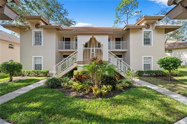 8073 Panther Trl Unit 1403, Naples, FL 34113 - view of property featuring stairway