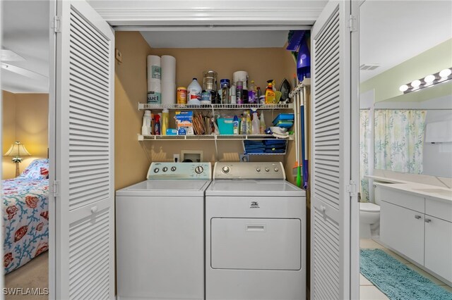 8073 Panther Trl Unit 1403, Naples, FL 34113 - laundry area with laundry area, visible vents, and separate washer and dryer