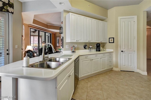 96 Vivante Blvd Unit 211, Punta Gorda, FL 33950 - kitchen featuring white cabinetry, light countertops, light tile patterned floors, and a peninsula