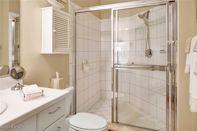 96 Vivante Blvd Unit 211, Punta Gorda, FL 33950 - bathroom with vanity, a shower stall, and a textured wall