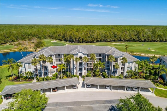 10329 Heritage Bay Blvd Unit 1622, Naples, FL 34120 - aerial view of a golf club, a heavily wooded area, and a nearby body of water