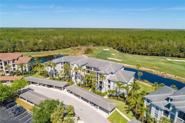 10329 Heritage Bay Blvd Unit 1622, Naples, FL 34120 - bird's eye view of a heavily wooded area, a golf club, and a large body of water