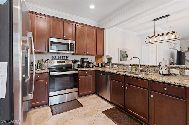 kitchen featuring light stone countertops, ornamental molding, light tile patterned flooring, a sink, and stainless steel appliances