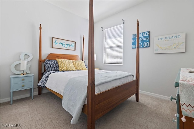 bedroom with carpet and baseboards
