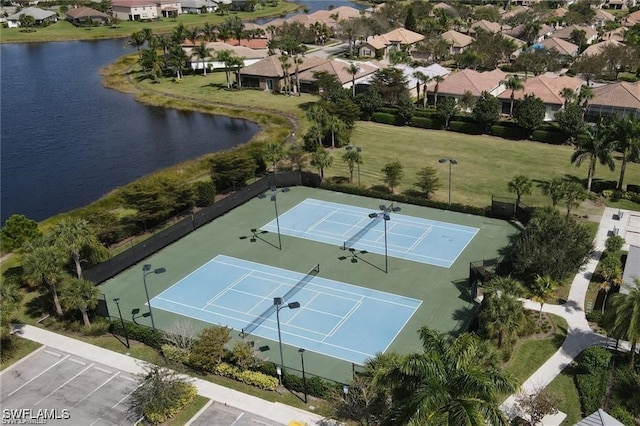 aerial view featuring a water view and a residential view