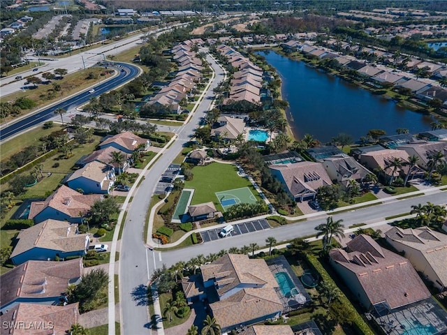aerial view featuring a residential view and a water view