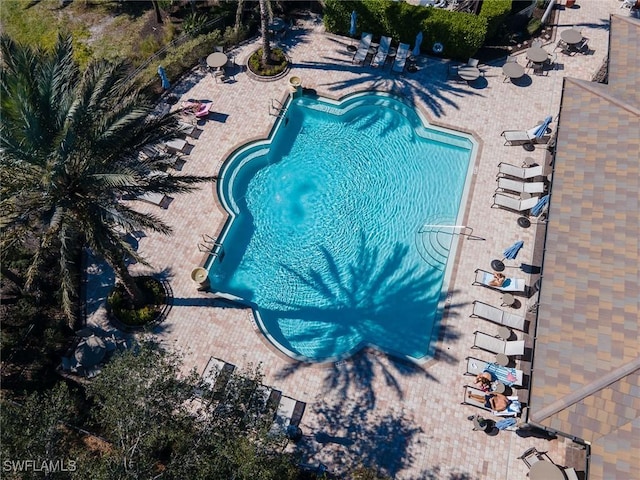 community pool with a patio
