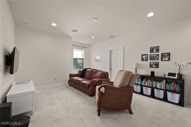 living room featuring light carpet, visible vents, recessed lighting, and baseboards