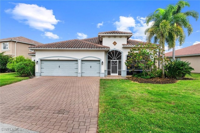 2160 Vardin Pl, Naples, FL 34120 - mediterranean / spanish house with an attached garage, decorative driveway, a front yard, and stucco siding