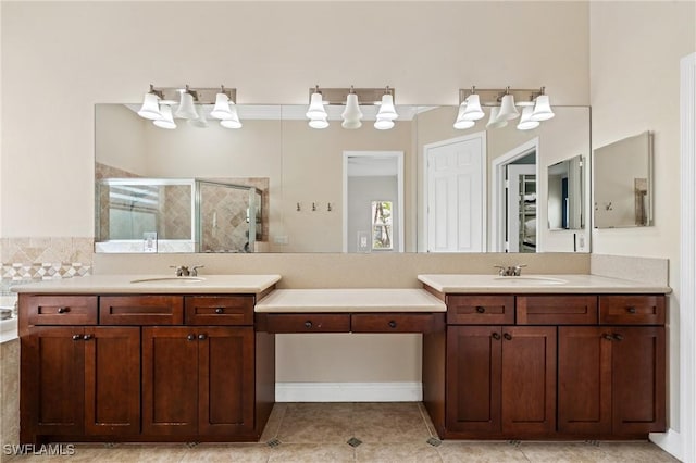 2160 Vardin Pl, Naples, FL 34120 - bathroom featuring a stall shower, two vanities, and tile patterned flooring