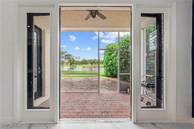 2160 Vardin Pl, Naples, FL 34120 - doorway featuring a water view and a ceiling fan