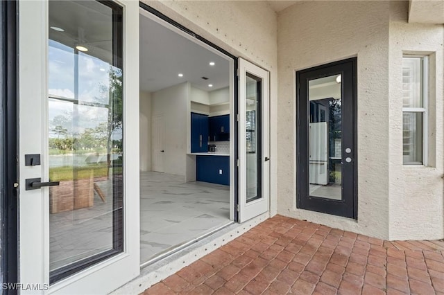 2160 Vardin Pl, Naples, FL 34120 - property entrance featuring stucco siding