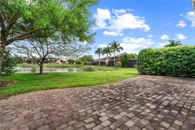 2160 Vardin Pl, Naples, FL 34120 - view of patio with a water view