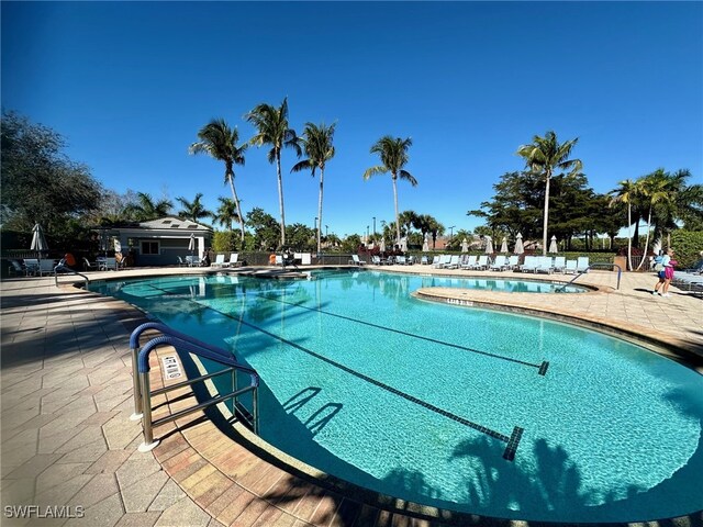 9119 Links Dr, Fort Myers, FL 33913 - community pool with a patio