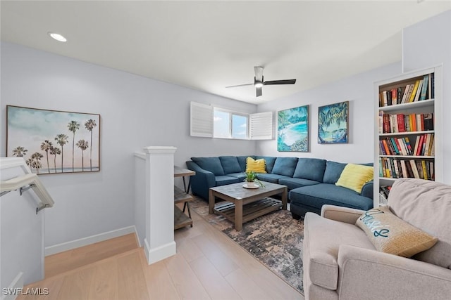 9119 Links Dr, Fort Myers, FL 33913 - living room featuring baseboards, light wood-style flooring, and a ceiling fan