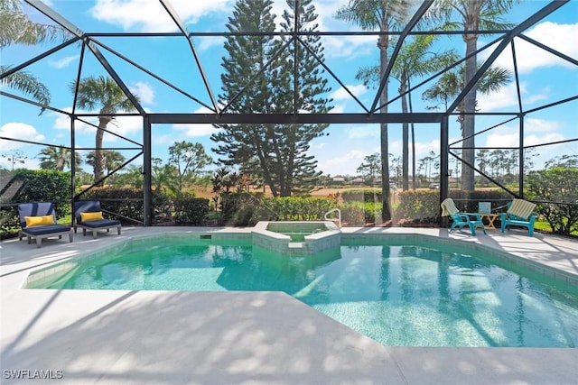 9119 Links Dr, Fort Myers, FL 33913 - view of swimming pool with a pool with connected hot tub, a lanai, and a patio area
